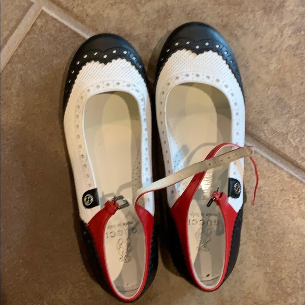 Kids size 32 Gucci shoes.